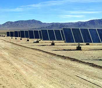 Photograph of an array of solar panels in the Chilean dessert